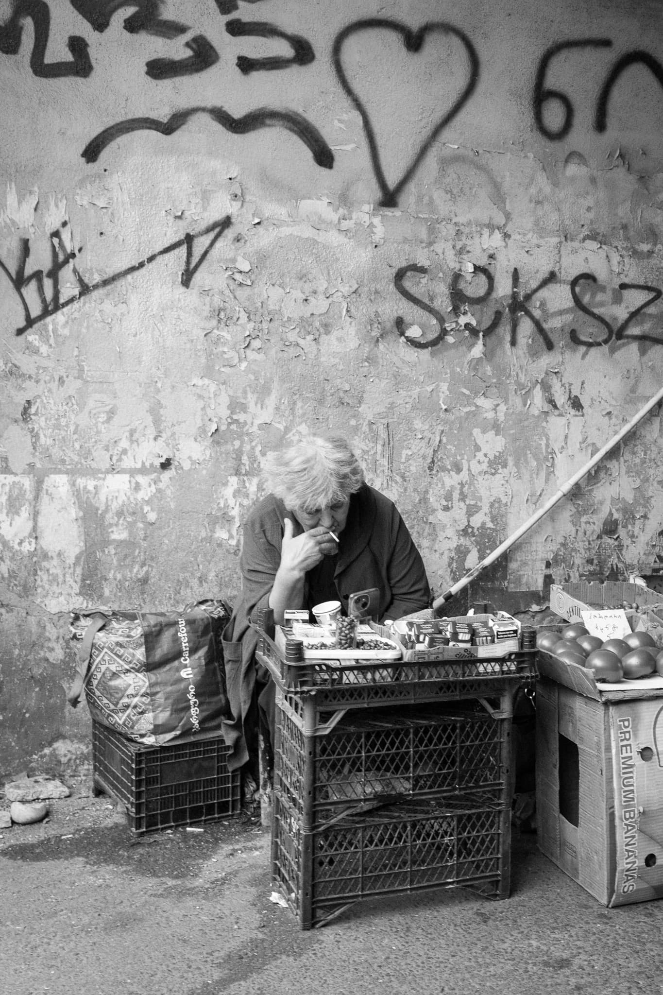 A market stall holder (black and white)